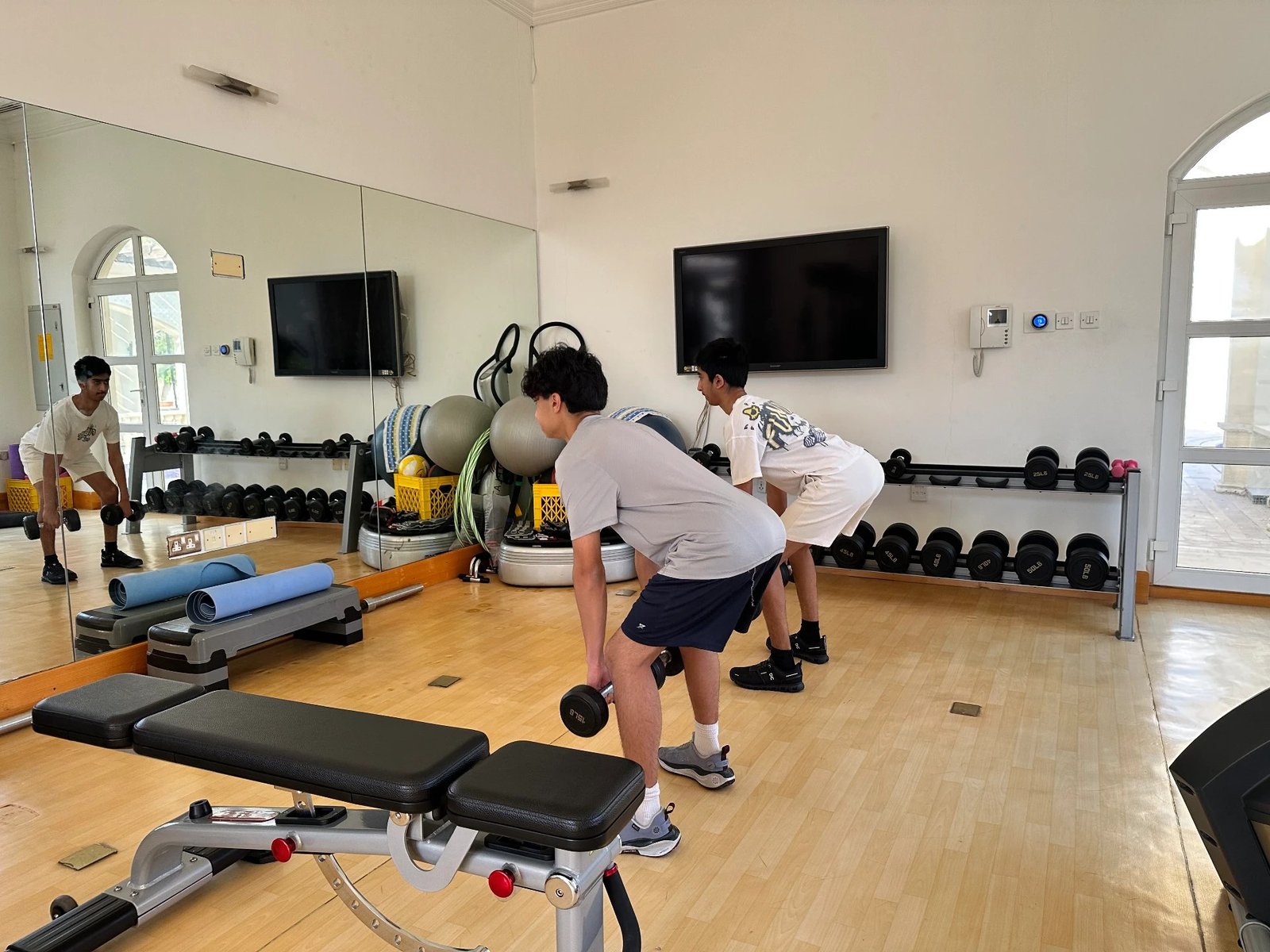 Teenagers training in a gym